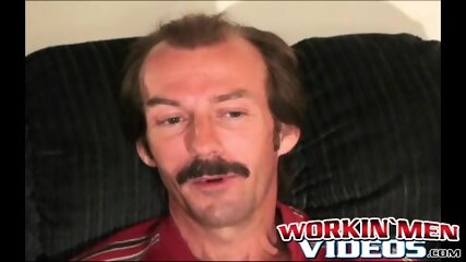 Guy with a mustache tugs his cock before cumming hard