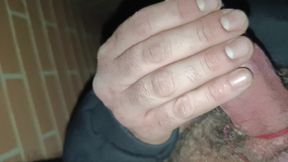 I jerk off and cum outdoors with elastic on my cock