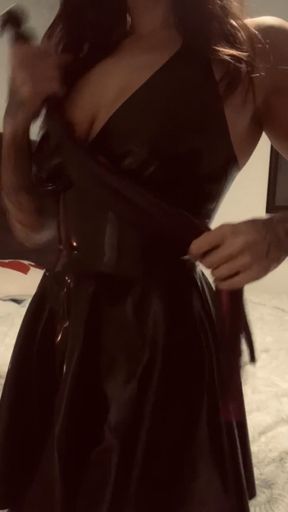 A latex, flogger and booby tease!