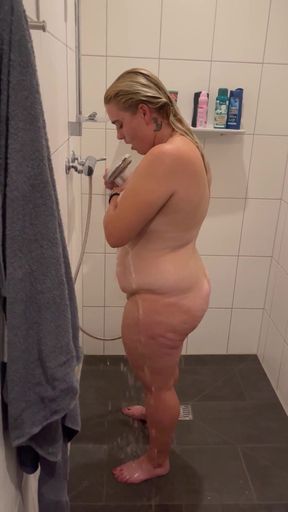 Wet pussy is brought to orgasm by the hot water jet. She wants to be fucked by her horny husband.   Clip 2