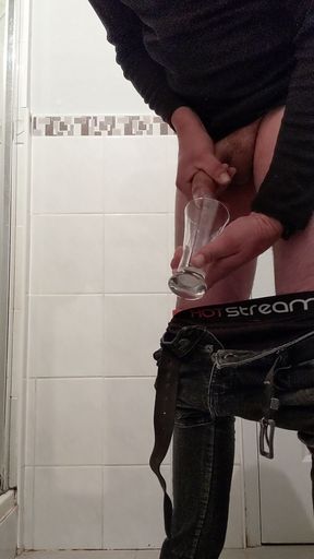 He jerks off and spits his into a glass