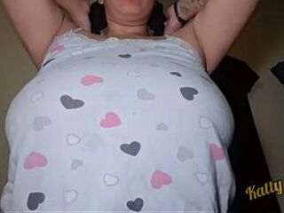 Katty Milk plays and shakes her massive natural melons in front of the camera