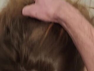 Curvy redhead gets on her knees and swallows for the 1st time