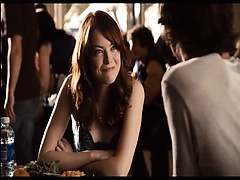 Here is Emma Stone showing us her sweet cleavage and hot