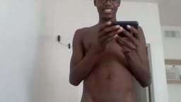 Black Guy Talking on His Phone While Naked