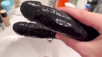Tatted goth girl stuffed by big toys while she gushes on her massive clit