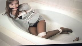 Pretty brunette businesswoman Nika Noire struggled in her bathtub after she was bound and gagged!