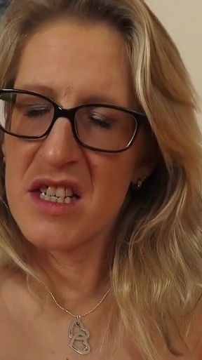 Blonde milf shows her horny pussy while she dildoes herself