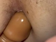 playing with fake cock