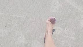 Walking on the sand of the beach on my trip