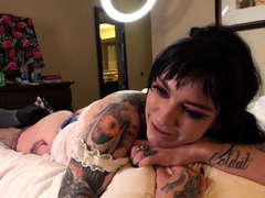 Busty brunette Misha Montana gets a new leg tattoo