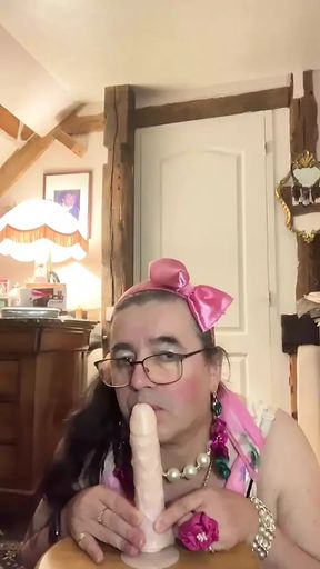 Outfit with a little floral dress to suck a dildo