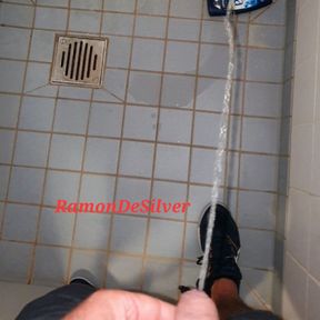 Master Ramon pisses horny in the shower.  very hot