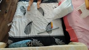 Sensual massage of a hot couple with oil on the body. Foreplay in the bedroom with a couple of amateurs.