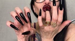 Black long nails, sharp claws, long fingers and hands worship