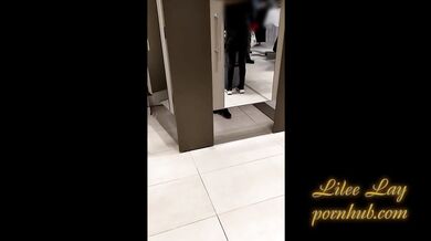 Redhead flashing in pantyless mall fitting room