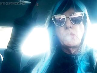 AGED CD SMOKIN' & DRIVING WITH A MB100 CIGARETTE IN HER GLOVED HAND