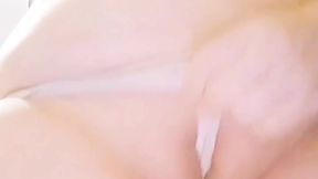 Japanese babe shows off big tits and spreads her pussy