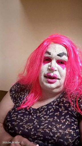 Femme TV clown smokes and gives jerk off instruction