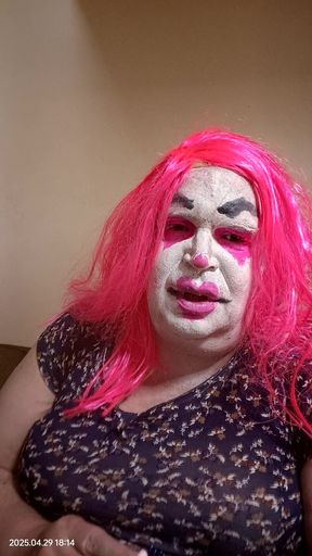 Femme TV clown smokes and gives jerk off instruction