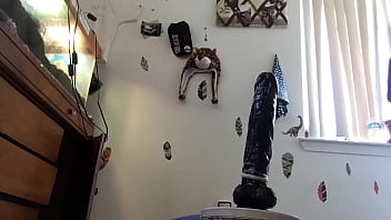 Riding a dildo