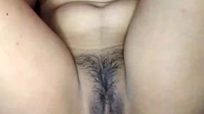 Sultry babe's furry muff gets ravaged by a buzzing sex toy's eager vibrations.