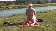 My wife and lover sunbathing naked on wild beach and fucking doggystyle. Naked in public Nudists Naturists Outdoor Outside Sex Big natural tits Milf