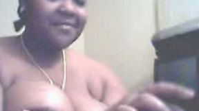 Fat ebony teen form Ohio flaunted her saggy melons on webcam for me