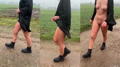 Girl outdoor on full nude walk in rain