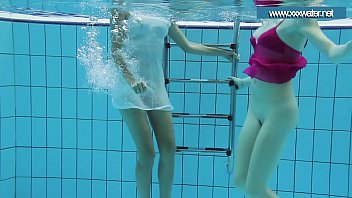 Hotly dressed teens in the pool