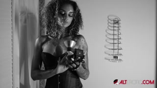 Leah Michelle in an artistic black and white solo