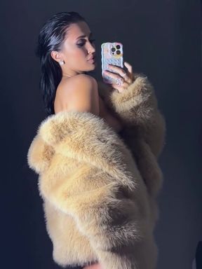 Blonde woman in fur coat