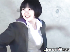 Watch Asian gals get filmed while spraying piss all over outdoors