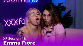 Busty babe Emma Fiore & Dani Ortiz show off big dildo during steamy lesbian kiss and interview