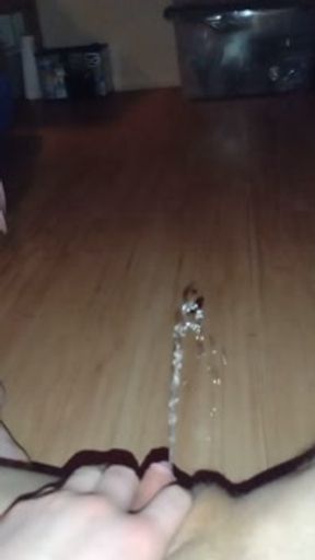 A long, relaxing pee on the floor