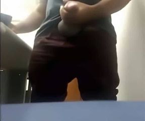 Brazilian Daddy Strokes His Big Uncut Cock at Work