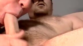 Massive bushy dude allows a mature gay to suck him dry