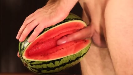 Muscular Stud Fucks and Cums on Watermelon