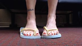Toe wiggling in flipflops closeup