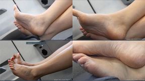 Amazing hot arched wrinjkled barefeet on seat