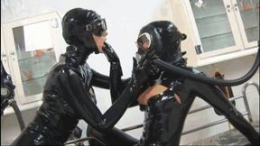 The black rubber gas mask fetish slut with her latex girlfriend - Pussy licking and fingering - Pissing on belly