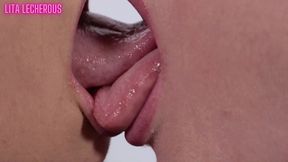 lesbians enjoy sloppy makeout and tongue sucking