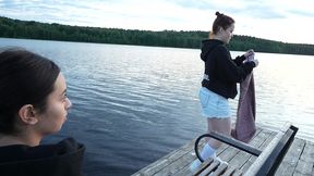 two girls took their clothes off on the lake. a passing surfer had sex in the open air.