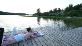 two girls took their clothes off on the lake. a passing surfer had sex in the open air.