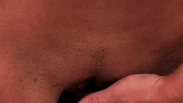 Takes off her panties and fucks her shaved pussy hard with fingers and suction dildo