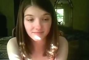 Short haired teen brunette with pretty face masturbates her fresh pussy