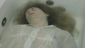 You are face up in bathtub where you try to go underwater and release a little air WMV HD 720p