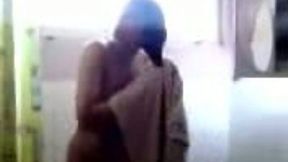 Slender big breasted Indian nympho changes her clothes on cam