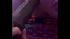Fucked in soaked asshole with huge black dildo
