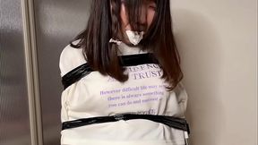 Asian girl lets herself be tied to a chair